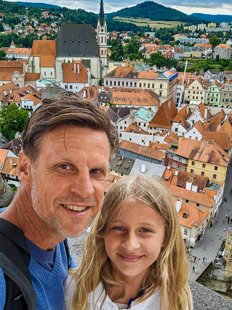 Dad and daughter exploring a medieval city