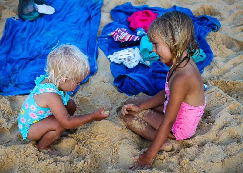 two young girls playing on Karon Beach Phuket Thailand